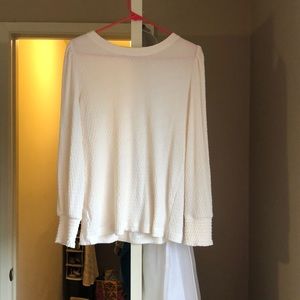 Cream colored long sleeve blouse with detailed cuffs from Loft